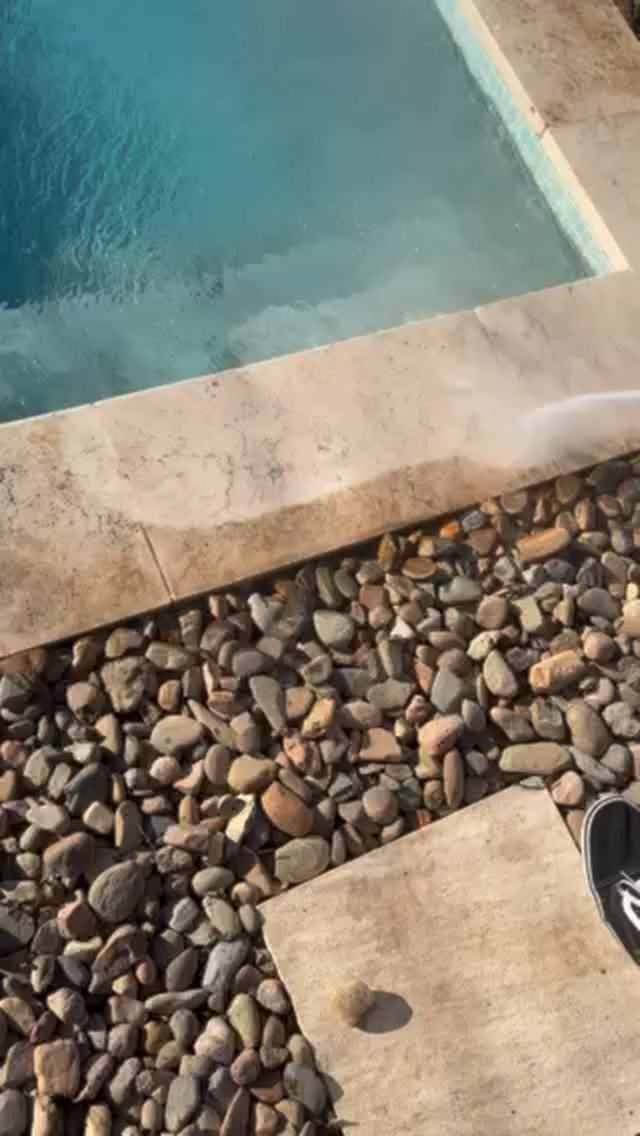 Pressure washing a driveway — before and after result