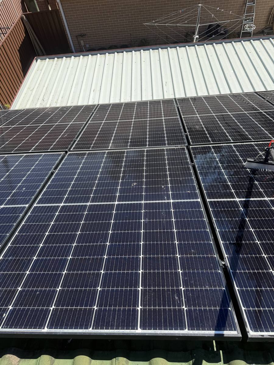 Solar panels being cleaned with purified water