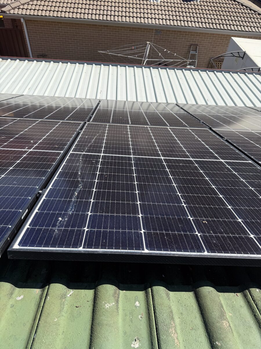 Solar panels before — covered in dirt and grime